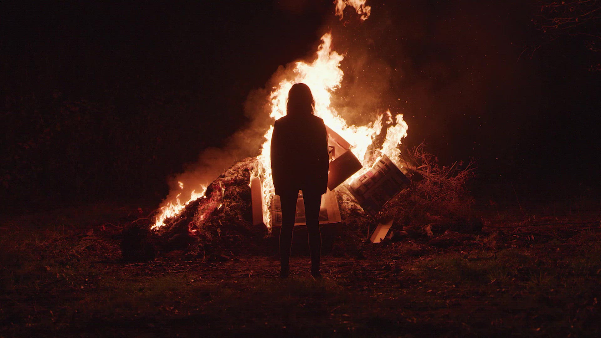 Woman Standing In Front Of Fire Filmpac