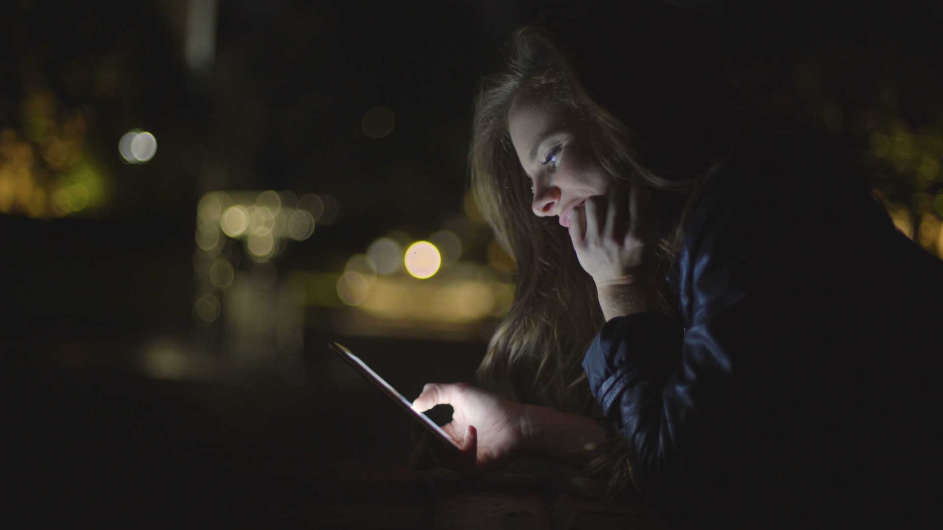Young Women on Phones in Dark FILMPAC