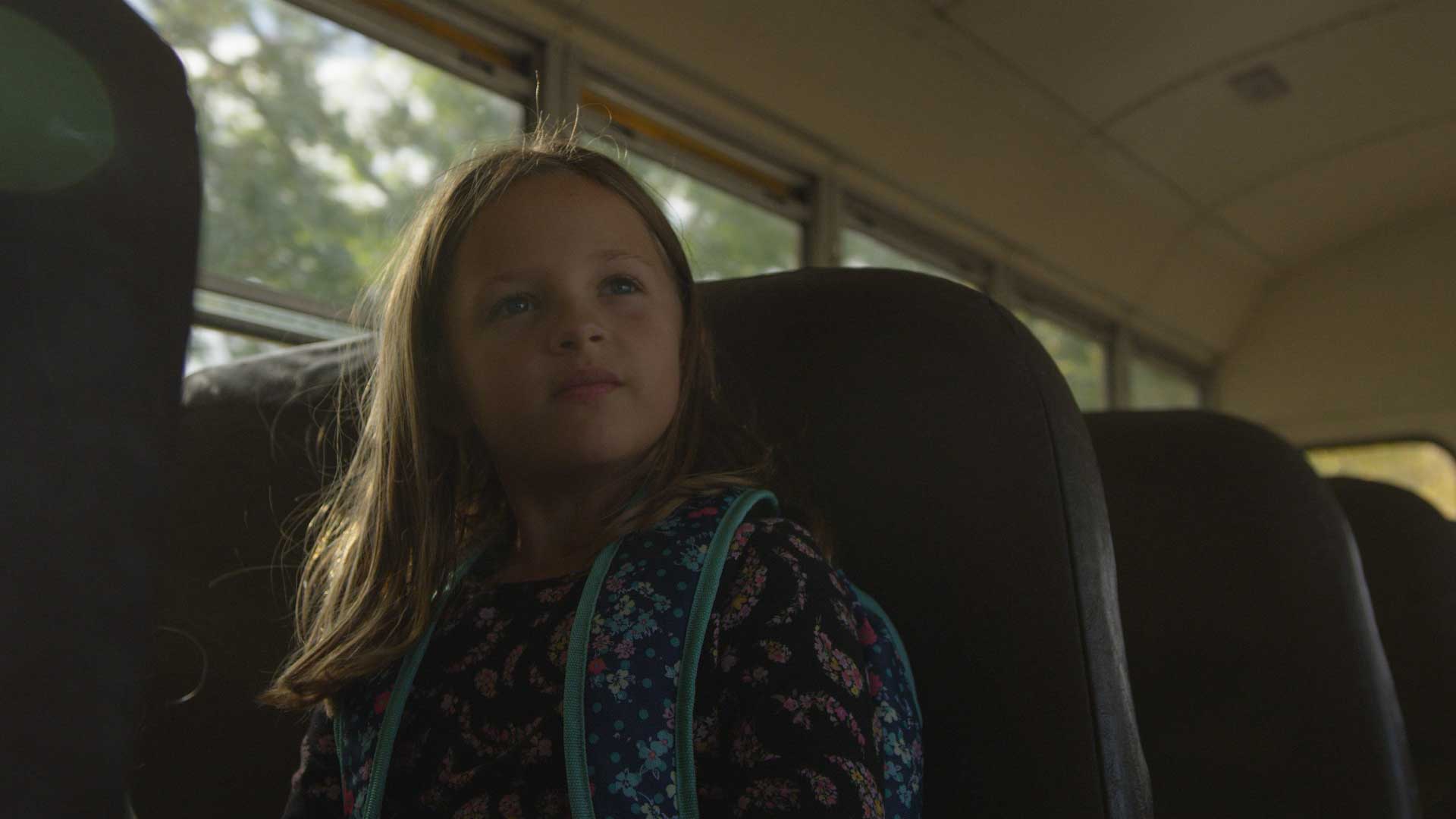 Young Girl Riding Bus To School FILMPAC