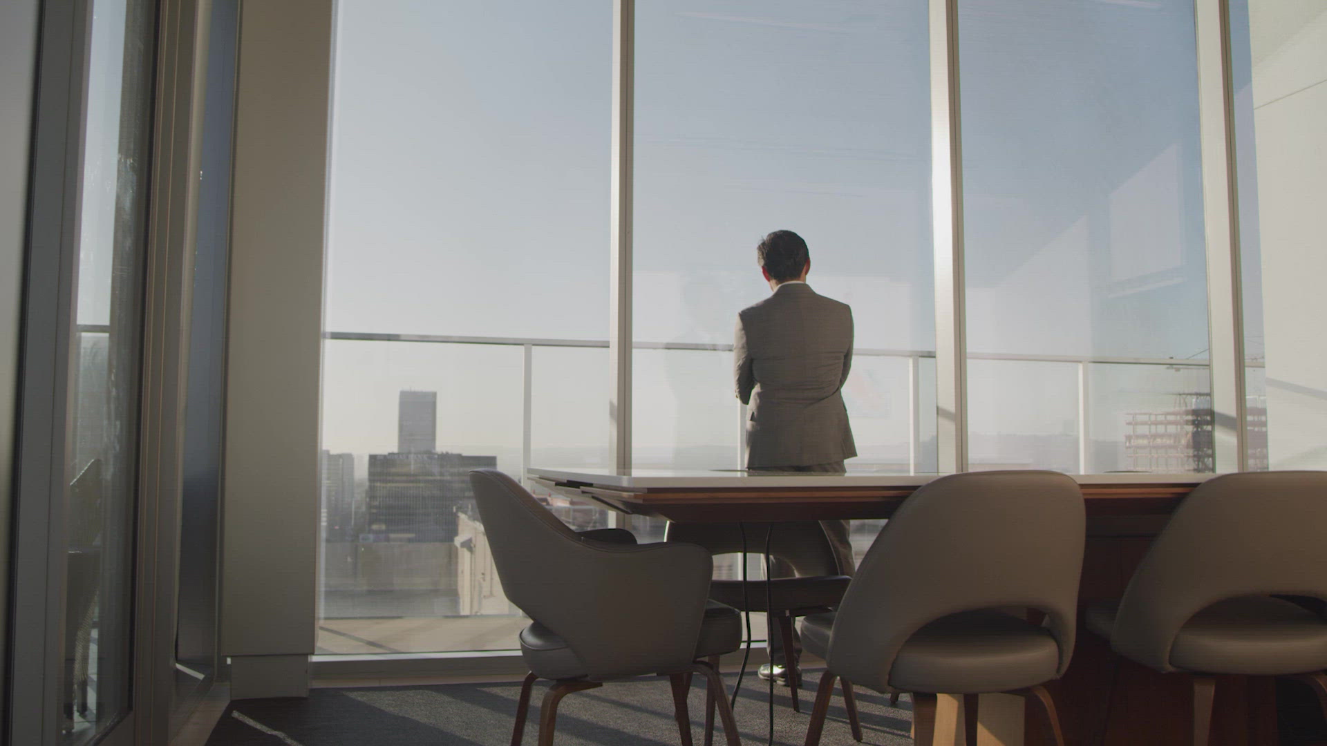 Corporate Man Looking Out of Office Window FILMPAC