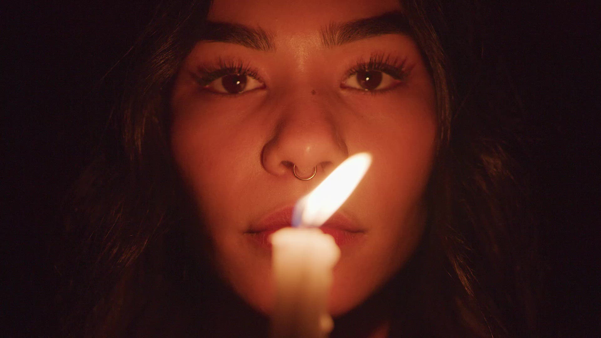 Woman Blowing Out Candle FILMPAC